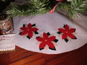 Poinsettia Christmas Tree Skirt from www.all-about-stencils.com